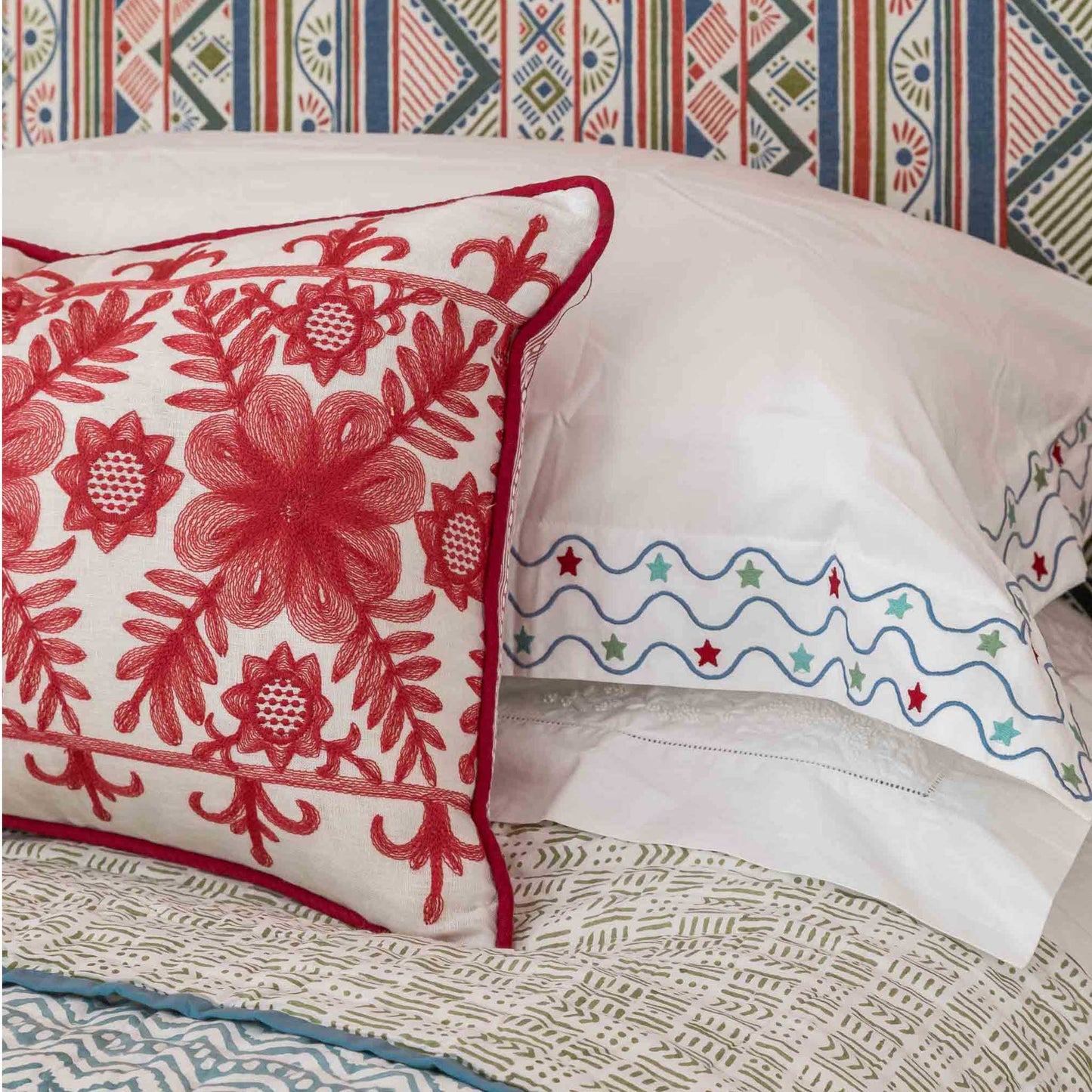 Floral motif embroidered oblong cushion coral reversible Wicklewood