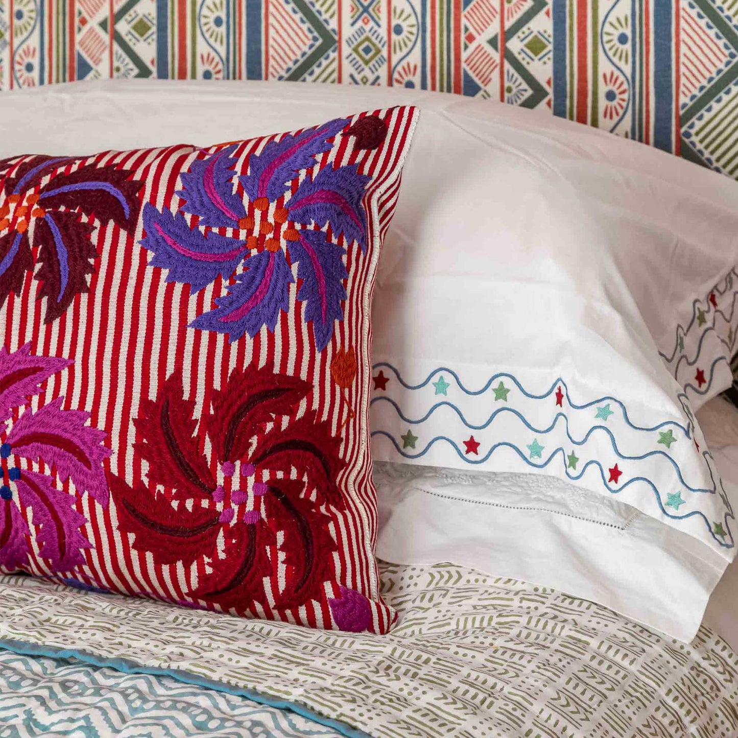 Striped floral motif Marcella Wicklewood oblong cushion red purple