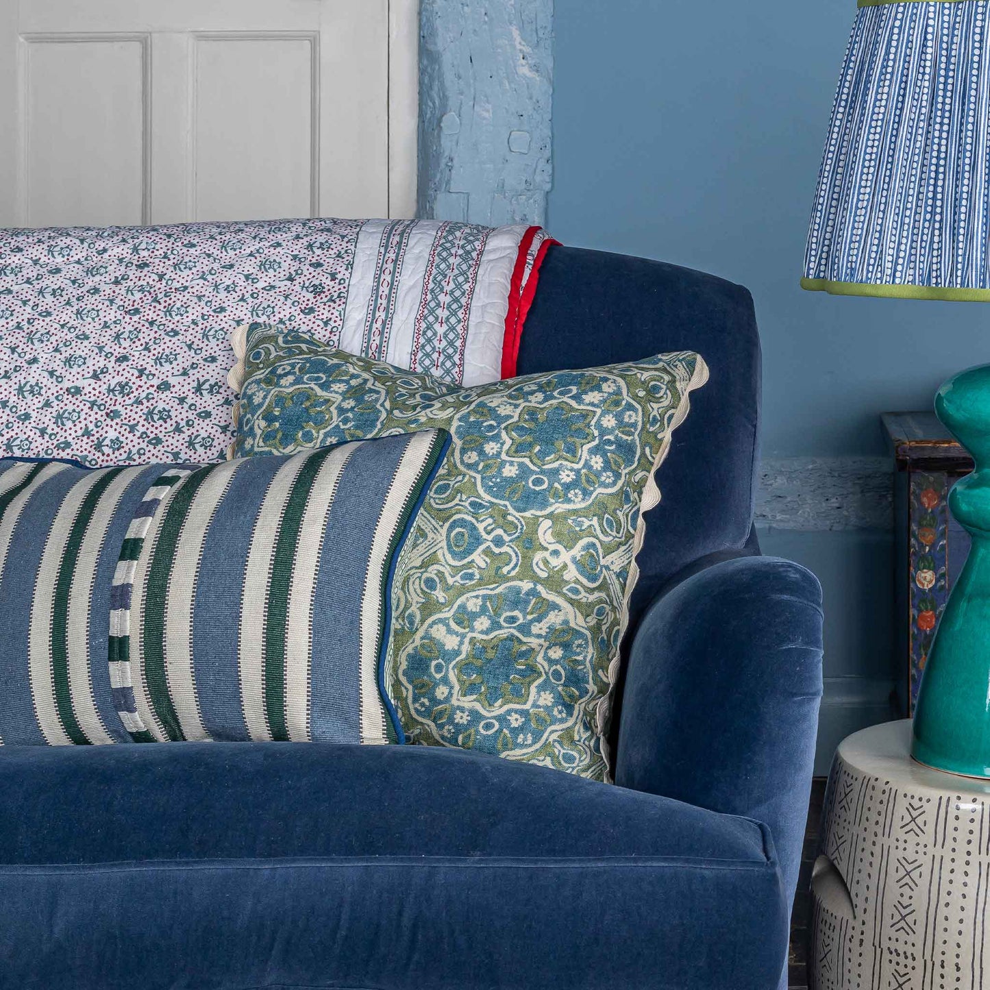 ashcombe patterned blue green cushion and embroidered oblong cushion