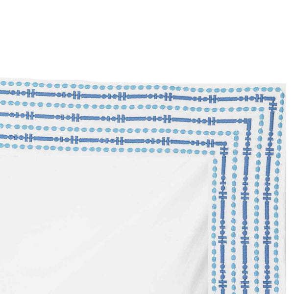 blue and white embroidered pillowcase
