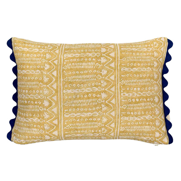 patterned yellow cushion navy trim