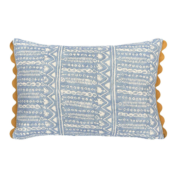 blue patterned cushion with yellow trim