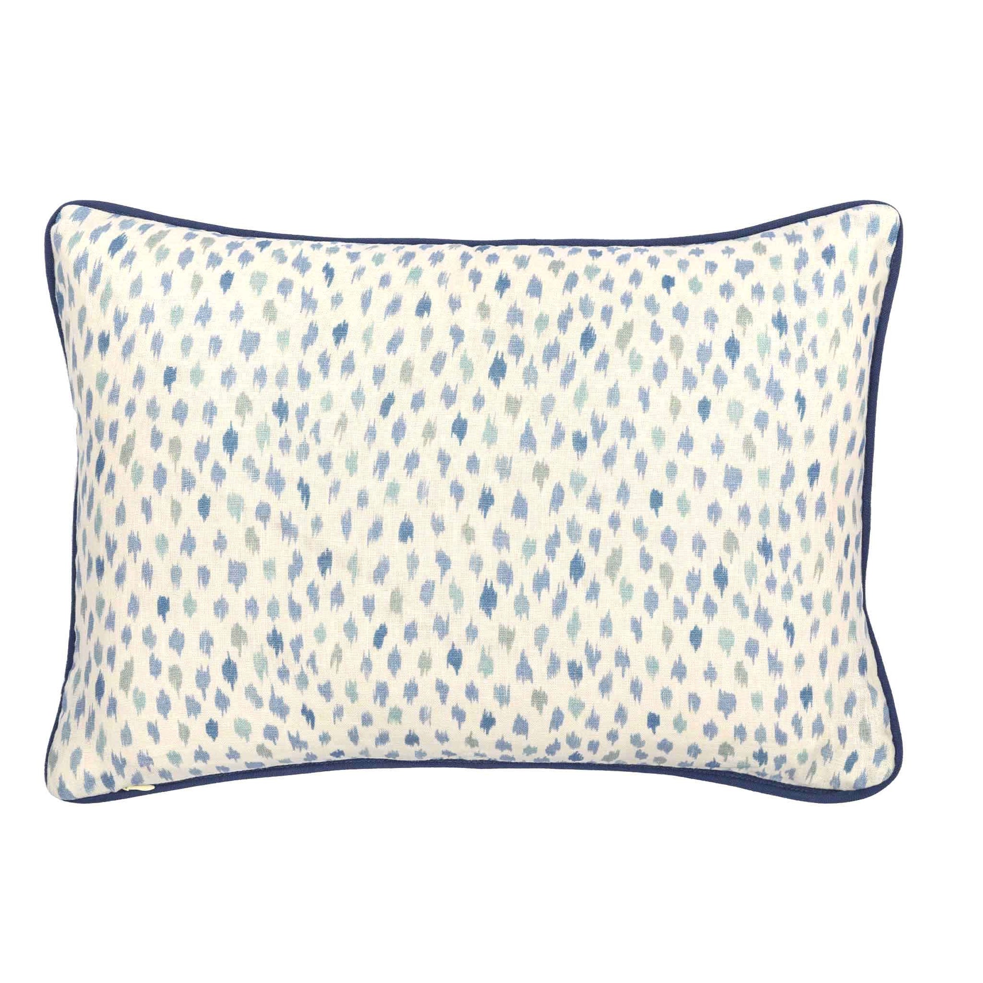 dotted patterned cushion blue trim