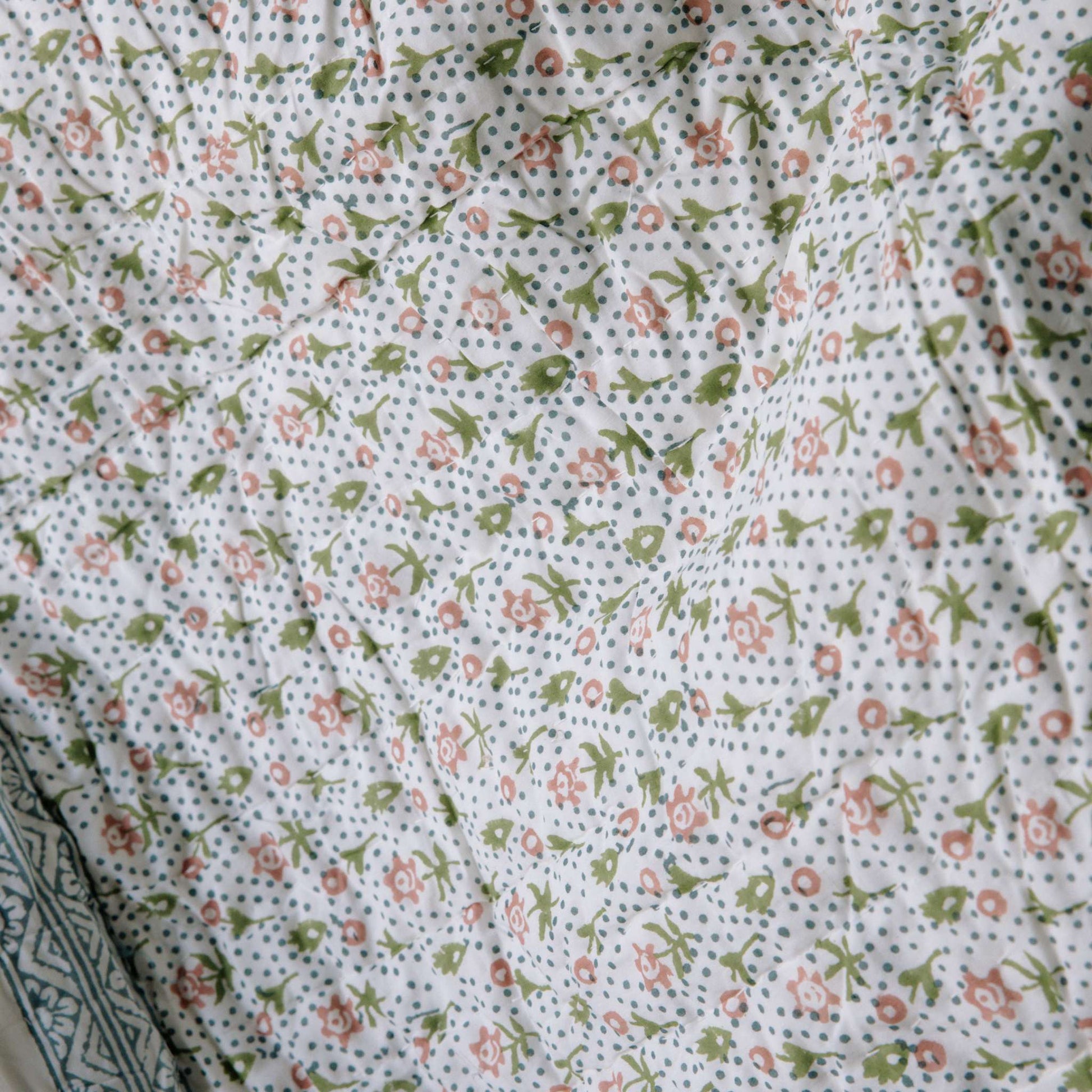 leilani reservible floral quilt