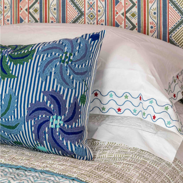 set of two pillow cases with blue green red star and wiggle motif