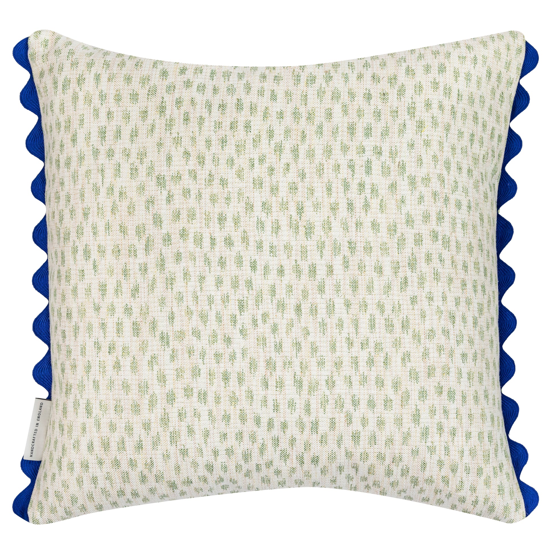 Reversible spotted green motif square cushion with indigo scalloped trim