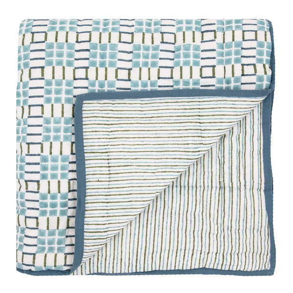 Blue and green hand block printed bed quilt in a checked motif pattern