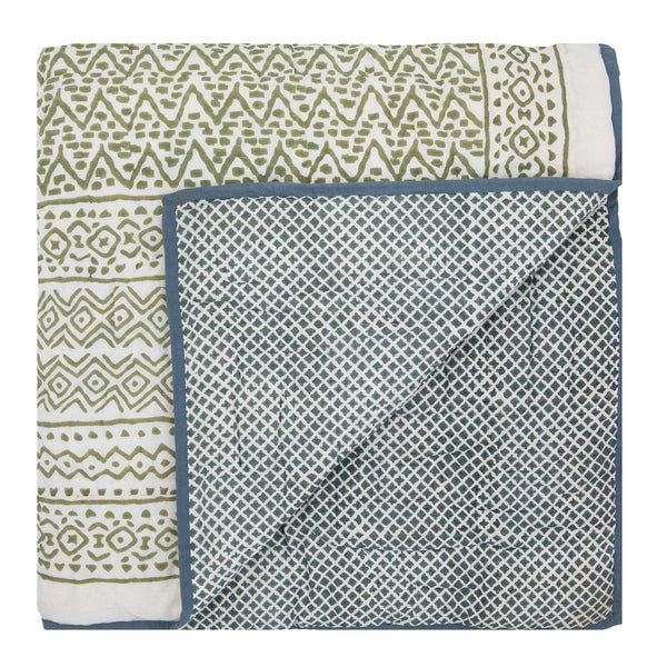 A green and blue reversible hand block printed bed quilt from Wicklewood