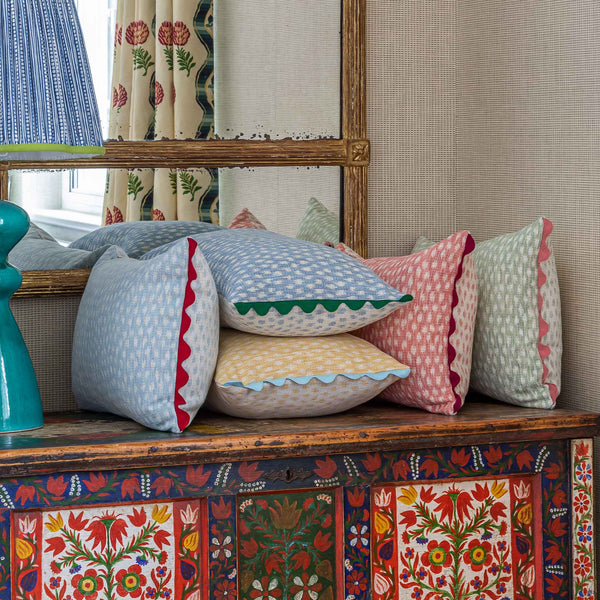 kemble dotted green and cream cushion with scalloped trim